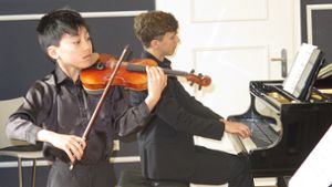Elfjähriger Könner an der Violine